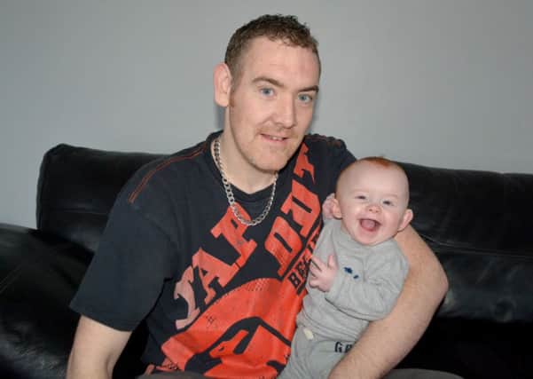 James McGee with little Wyatt who suffers from Plagiocephaly. James with his wife Kerry together are raising funds to help other young children with the illness. INLT 05-146-GR