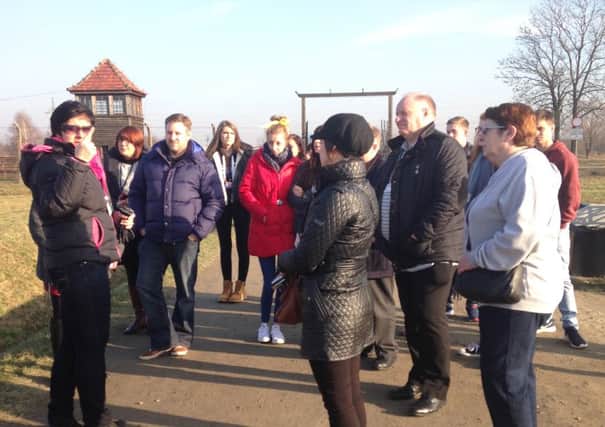 Some of the Carrick students during the trip to Auschwitz.  INCT 04-722-CON