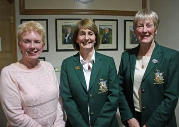 Past Lady Captain Pam Graham hands over the captaincy to new Lady Captain at Lurgan Golf Club  Fiona Cummins and new Lady vice Captain Fran McCann.
