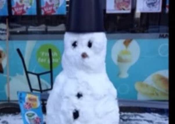 Happier times: Snowman in Pomeroy