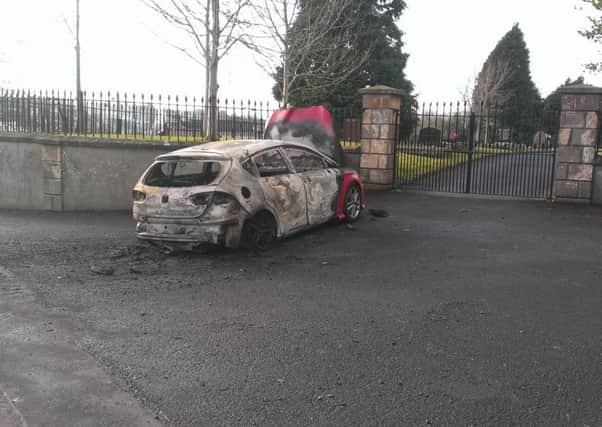 Burnt-out car in Draperstown.