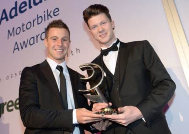 Andy Reid receives the Young Rider of the Year award from Jonathan Rea at the Adelaide Motorbike awards. Picture Stephen Davison