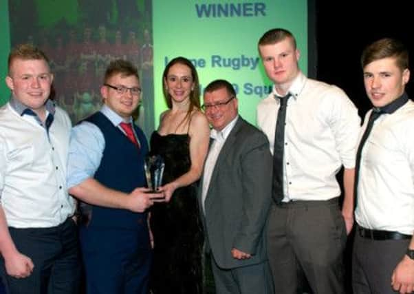 Flashback: Larne RFC Under-19s pick up the Junior Team of the Year award from Sports Forum member Martin Wilson and cycling star Wendy Houvenaghel at last year's gala bash.