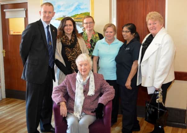 Peter Shepherd (left), Worshipful Master of St Columba Temperance Masonic Lodge, and his grandmother Millie Reid (seated) raised £1,040 for the Martin Residential Trust. They are pictured with Lisa McFarland, Penny McCanny, Ann Jones, Pennamma Paise and Heather Shepherd. INNT 05-144-GR