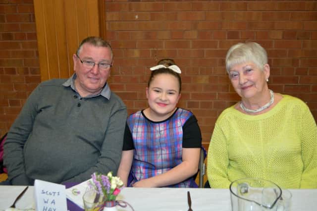 Tommy Campbell, Kennedy Meek and Heather Campbell at the Burns Night celebrations at St Nicholas' Church halls. INCT 05-177-GR
