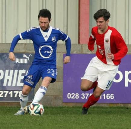 Adam Salley (right) in action for Linfield Swifts during their 3-0 Intermediate Cup win at Loughgall on Saturday.