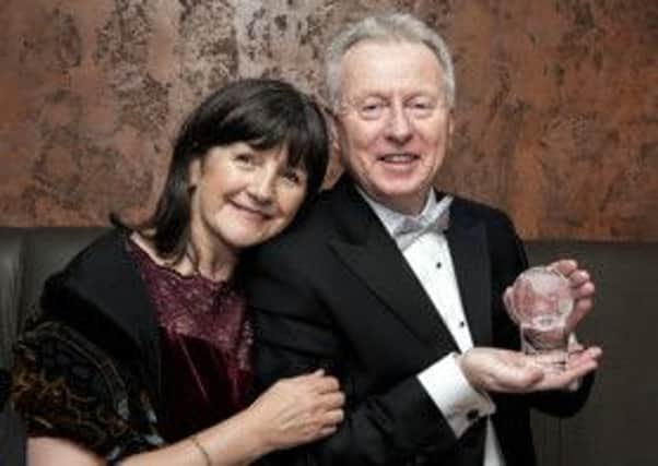Bill Abernethy, The Societies Architectural Photographer of the Year 2014, with his wife, Alison. INNT 05-501CON