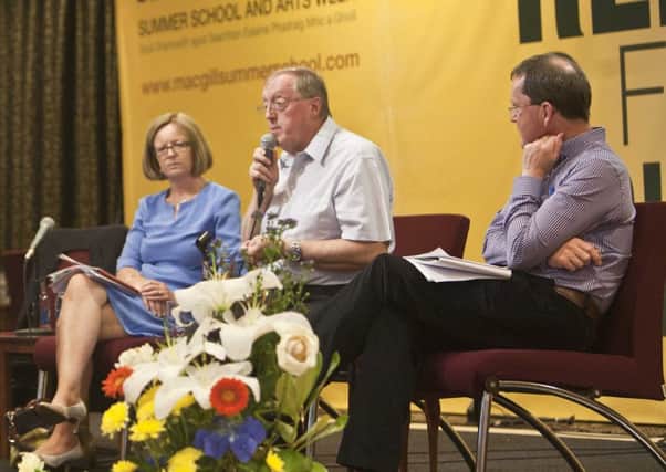 Nobel Peace Prize winner John Sweeney (centre) will address a climate justice event in the North West next month.
