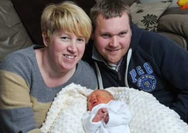 Coagh couple Sharon and Robert Ferguson with baby James