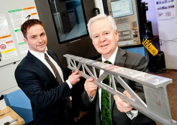 Smith's Engineering Works (NI) Ltd is investing £868,000 in an expansion at its Ballymena premises supported by Invest Northern Ireland.  Pictured (left) is Darwin Smith, Smiths Engineering, with Kevin McCann, Invest NI.