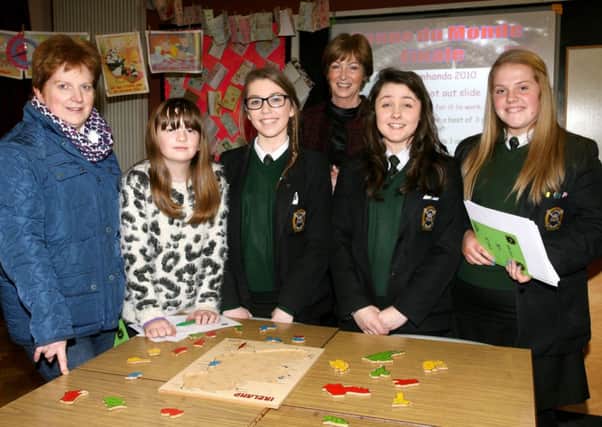 Rosalene and Chelsea Mitchell in the Irish room along with principal Mrs. C. Magee and pupils Regan O'Loan, Nadelle McKillop and Geraldine Hallsman, during the St. Patrick's College open night. INBT05-207AC