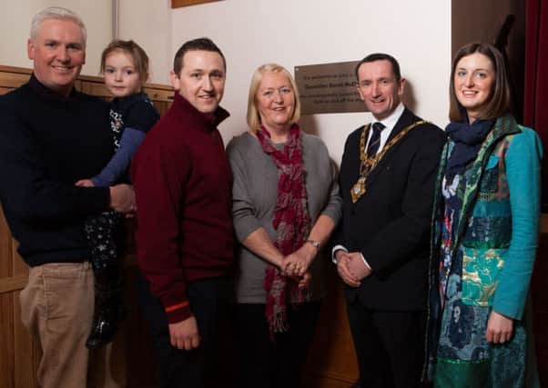 The  Mayor of Coleraine, Councillor George Duddy with David McClartys wife Norma, children Alan, Colin, Niamh and grandchild Erin at the dedication ceremony at Coleraine Town Hall.
