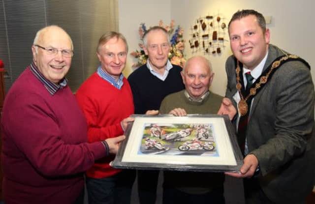 Sammy Spence, chair of Lisburn City Old Vehicle Club, and Dromara Destroyers members Brian Reid, Ian McGregor and Ray McCullough present Lisburn Mayor Andrew Ewing with a signed painting. US1503-534cd  Picture: Cliff Donaldson