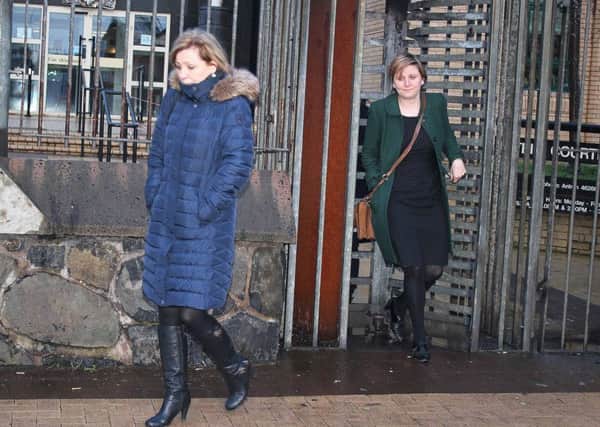 Anne Lennon (left)  wife of the late Peter Lennon, leaves Antrim Crown Court with her daughter Karen.
