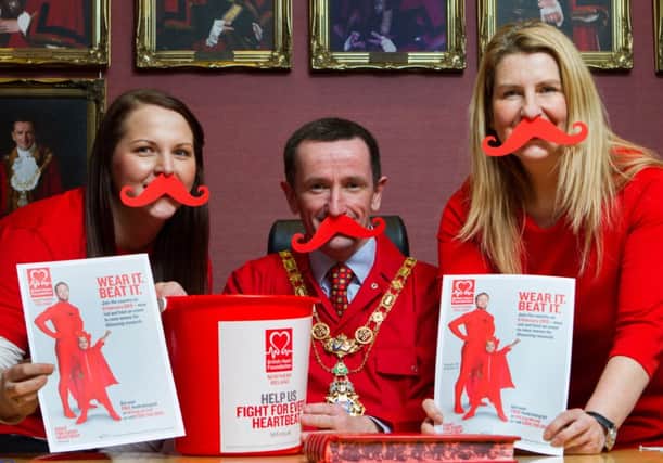 Mayor of Coleraine, Councillor George Duddy with Pearl Mahon, Health and Well-Being Officer and Alexis Bloomfield, Senior Environmental Health Officer at Coleraine Borough Council.