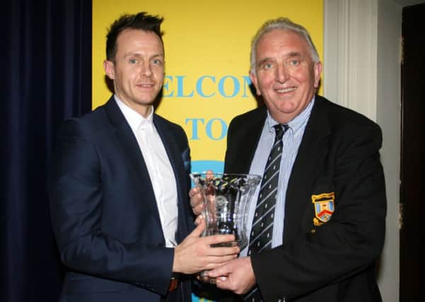 Tom Wiggins, of Ballymena Rugby Club, receives the Participation award from Paul Muir, of sponsors Diamond Recruitment. INBT06-224AC