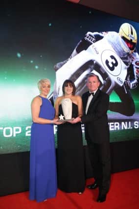 Pictured at the Linwoods backed Belfast Telegraph Sports Awards 2014, are Joanne Dunlop (centre) and Donna McLean (Joey Dunlop's daughters). Joey Dunlop was voted NIs Greatest Ever Sports Star  as voted by Belfast Telegraph readers. Sisters Joanne and Donna  received the award for their dad Joey, from Richard McClean (Managing Director of the Belfast Telegraph).