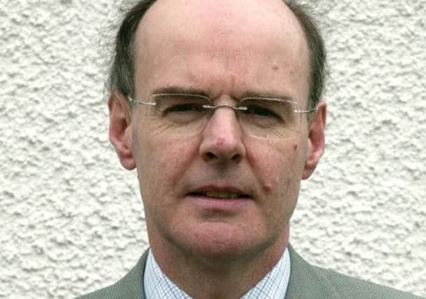 Councillor Declan O'Loan