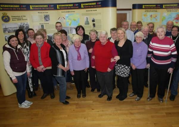 Group pictured at Irish Street Community Centre on Friday for the WW1-themed Luncheon Club Dinner, where they were treated to dinner and video presentations of World War One. INLS0415MC012