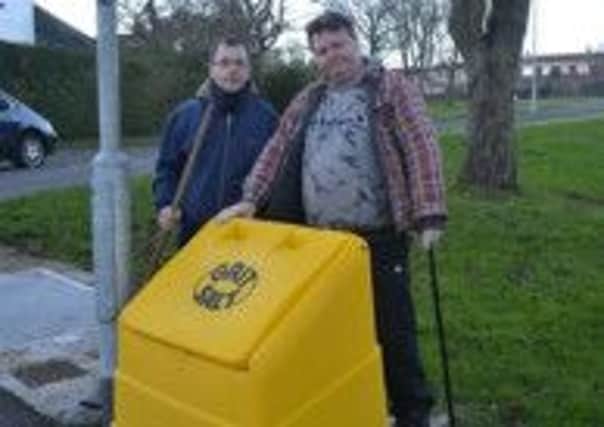 Jonathan Cooke, chairman, and Al Creighton, secretary of Davys Street Residents' Association pictured with the new salt box at the junction of Windmill Avenue and Model Way.   INCT 06-729-CON