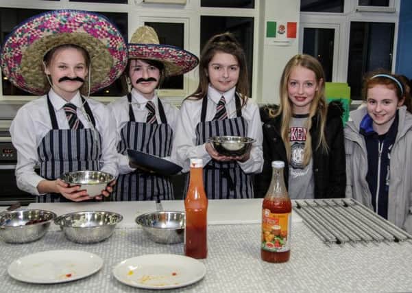 Glengormly High School open night Home Economics Class,  Broooke Young,Katie Nelson, Frances Walker With p7 pupilS Jodie Hamilton Paige Henderson   INNT 6-506-SO