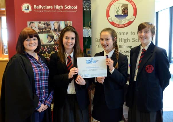 Teacher in charge of eSafety, Mrs Hill with pupils Katie Shearer, Zara King and Victoria Glenn. INNT 06-539CON