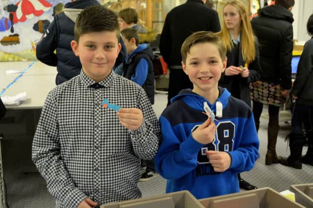 Karl Nicholl and Reece Flanagan show off their aeroplanes in the Design and Technology department at Downshire School open night. INCT 06-107-GR