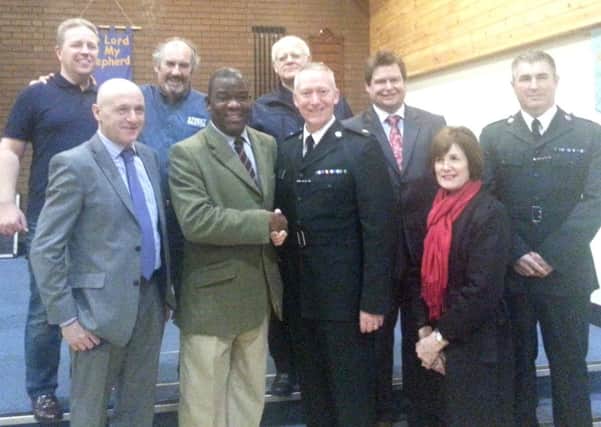 Rev Les Isaac pictured at the Commissioning Service with T/Supt Stephen Reid and representatives from Newtownabbey Street Pastors, the local PCSP and Antrim and Newtownabbey District Council. INNT 06-542CON