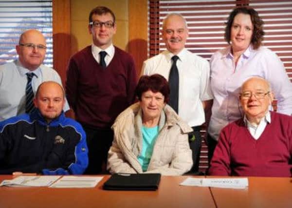 Chairperson of Cookstown Disability Forum Ursula Marshall with members and council representatives at their last  meeting before the super council swings into action