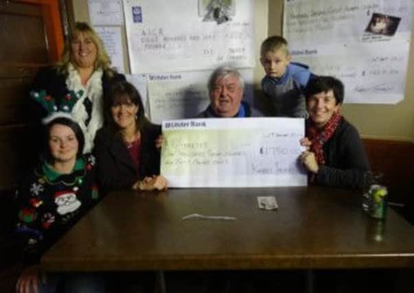 The Diabetes team at Altnagelvin were recently presented with a generous donation of £1,750 from Knobbs Tavern, Kildoag, the proceeds of fundraising activities. Pictured from left to right: Laura May Jackson, Muriel Hamilton, Anne Marie McDaid Diabetes Specialist Nurse Western Trust, Morris McKeegan, Stephen Lynch and Lesley Hamilton, Diabetes Network Manager Western Trust.