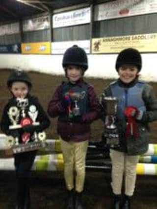Friday night cup winners Robert Russell, Catherine McClelland and Todd Bryson at Mossvale Equestrian Centre.