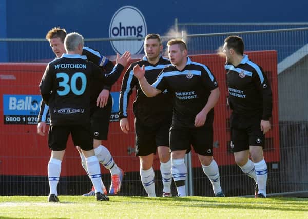 Ballymena United players celebrate David Cushley's goal against Linfield last Saturday. Picture: Pacemaker Press.