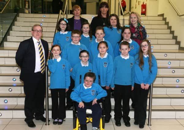 The Castle Tower percussion group and choir who performed at a special evening in The Braid where the school outlined the proposed plans for the new School. Included is David McCann (senior management team), Donna Marie Higgins, Tracey Poland and Stephanie Cardwell. INBT06-203AC