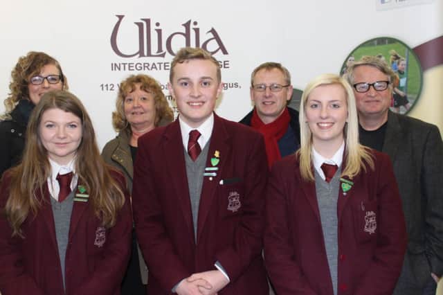 (Front) Ulidia Integrated College head prefect Thomas Adams and deputy head prefects Katie McNally and Rachel Morrow with (back) Kellie Turtle, education worker; Commissioner Marion Reynolds, Commissioner Alan McBride and Chief Commissioner Les Allamby. INCT 06-706-CON