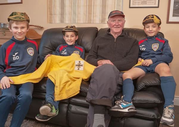 Coleraine Academy players Ben, Rhys and Kaleb get to meet the legend behind the "Harry Gregg Foundation" hear some of his stories and touch some mementos of his amazing career.

photo:Derek Simpson
Mandatory Credit