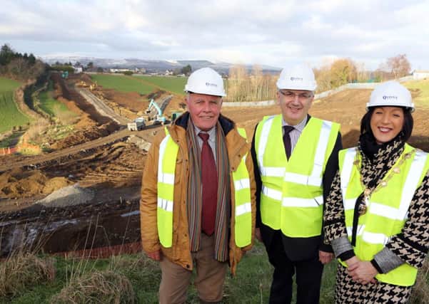 Transport Minister, Danny Kennedy, pictured with the Mayor of Derry Councillor Brenda Stevenson, and Edmund Quinn of Quinn Automatic Ltd.