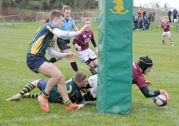 Schools Rugby - Round 3 - Down High v Coleraine Academical Institution - 7th February 2015
Presseye Declan Roughan

Down's Charlie Power cant stop Coleraine'sOlicer McDowell  from scoring a try