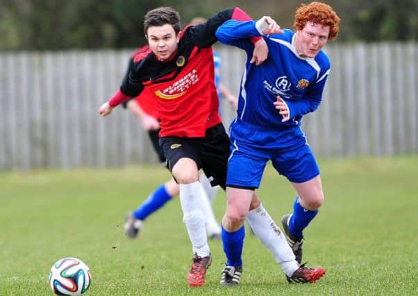 Tobermore Utd and Coagh Utd tussle for the ball during Saturday's league clash at Fortwilliam Park.INMM0615-303