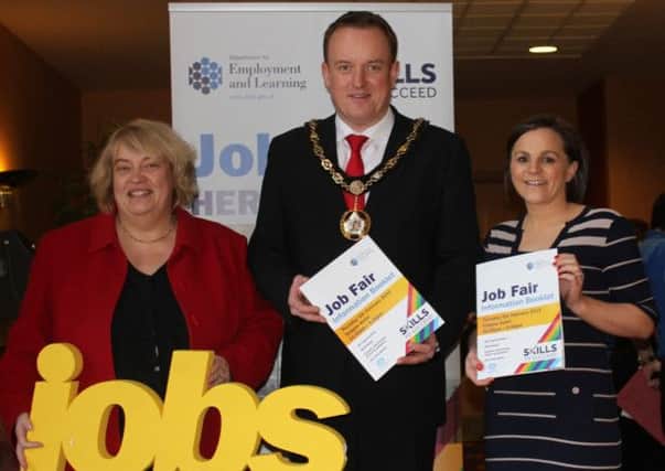 1,700 attend Craigavon Job Fair
Over 1,700 people have attended the Job Fair held on Thursday 5 February at Craigavons Seagoe Hotel. The event, which was free and open to all, was organised by the Department for Employment and Learning (DEL) in conjunction with Craigavon Borough Council. Over 40 employers were in attendance with over 450 vacancies on offer. Advice and guidance was also available on a range of training and re-skilling opportunities. Major employers with jobs available included Almac, Omniplex Cinemas, Teleperformance and Fane Valley. Pictured are Pauline Millar, DEL Employment Service Deputy Director,  Councillor Colin McCusker, Mayor of Craigavon Borough Council and Kim Nesbitt, Recruitment Manager at Almac Group.