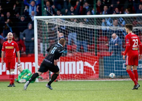 David Cushley wheels away after scoring Ballymena United's late winner at Solitude. Picture: Press Eye.