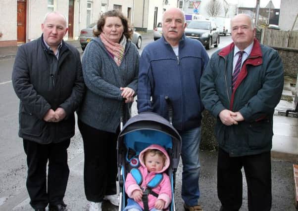 Ballymena Alderman Martin Clarke and Mid & East Antrim Councillor Reuben Glover pictured at Toome Road with local residents Alison McCaw, Cira; and Eddie McCandless. INBT 06-806H