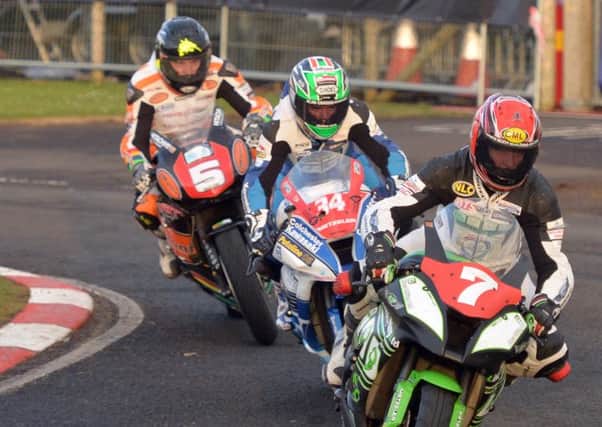 Gary Johnson leads Alastair Seeley and Bruce Anstey on his way to a podium finish on a Kawasaki in the 2013 Suerpstock race at the Vauxhall International North West 200.
PICTURE BY STEPHEN DAVISON