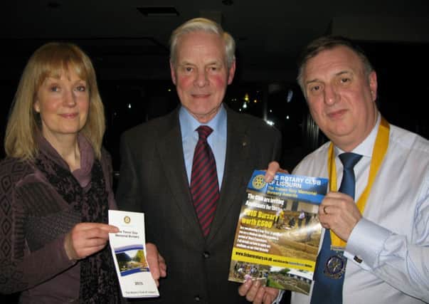 Gary Corkin, vice President of the Rotary Club of Lisburn discusses the launch of the 2015 Bursary with Helen Coulter and Stephen Gilbert, both Trustees of the Bursary.