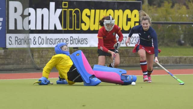 Sarah McCabe makes a crucial save as Ballyclare push for a late equaliser. Pics: Rowland White / Presseye.