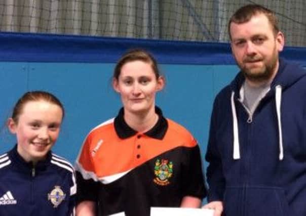 'Last Man Standing' winners Eimear McGarrity and  Gavin Rodgers receiving their prizes from Alice Smith