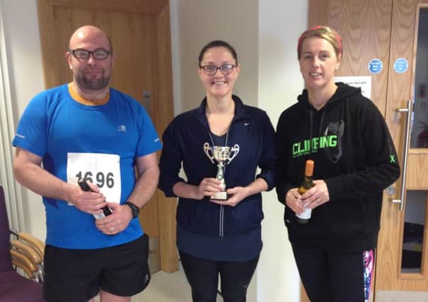 (l-r) Larne AC's Rory McGregor (third), Laura McGrillis (first) and Amanda Wood (second) pictured after the Ballygally Handicap race