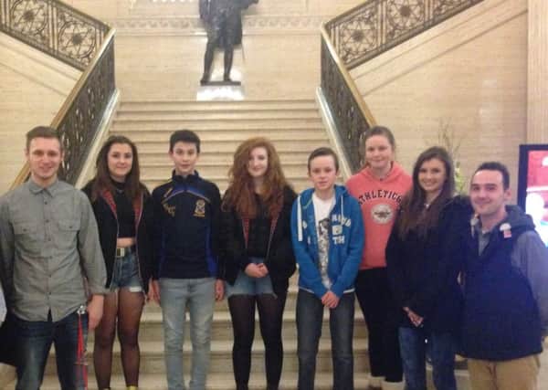 East Antrim Alliance MLA Stewart Dickson hosted a visit by members of Larne YMCA at Stormont recently. INLT 07-682-CON