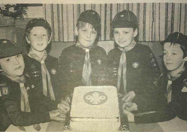 A special cake was made to celebrate 4th Carrickfergus Cub pack's 60th birthday. INCT 07-740-CON HIST