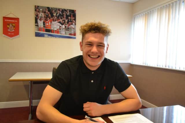 Lisburn teenager Ben Kennedy has this week realised his lifelong dream of securing a professional contract - reason enough for such a cheesy grin! He has been impressing with his performance for League Twos Stevenage FC and has been rewarded. Pic: Stevenage FC.