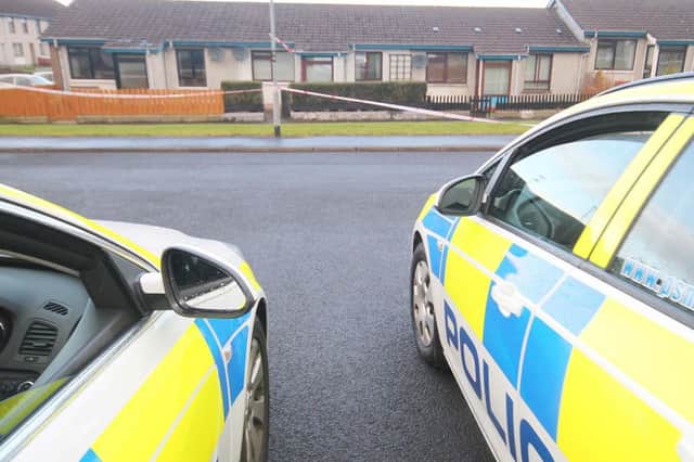 Police cars at the scene of a shooting at Glenvara Drive in Ballysally estate in Coleraine on Thursday morning. PICTURE MARK JAMIESON.